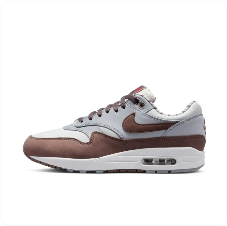 Nike Air Max 1 Light Silver Smokey Mauve - side profile showing silver leather base, chocolate brown overlays and tonal Swoosh