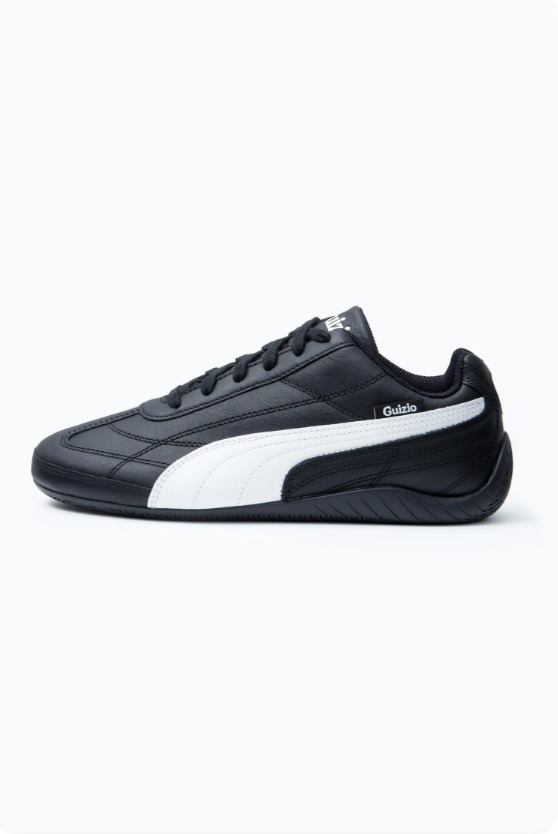 Puma Speedcat Guizio Black White - side profile showing black leather upper, white Formstripe and Guizio co-branding script detail