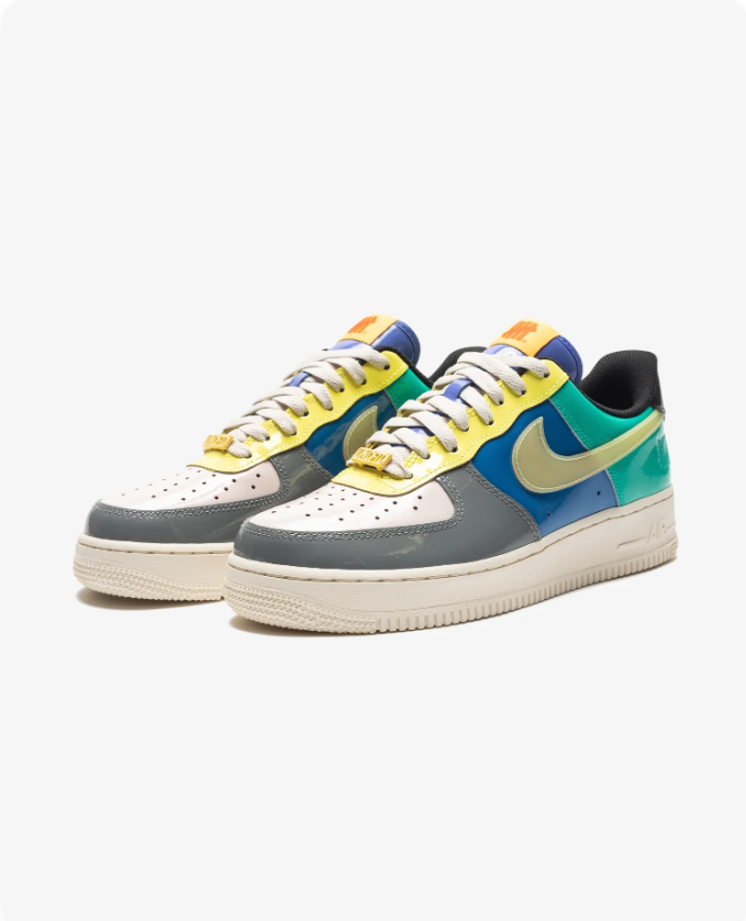 Nike Air Force 1 Low x UNDEFEATED Multi-Patent - front pair view showing multicolor patent leather panels and lime Swoosh