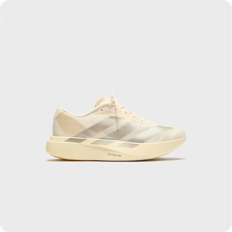 Adidas Adizero SL2 - side profile view showing cream white mesh upper, translucent gold Three Stripes and Lightstrike Pro midsole