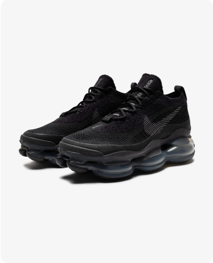 Nike Air Max Scorpion FK Triple Black - front pair view showing all-black Flyknit upper and Air Scorpion bubble sole
