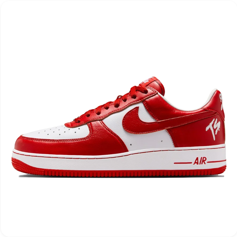 Nike Air Force 1 Low x Travis Scott - side profile showing white leather base, red overlays and TS embroidery on heel