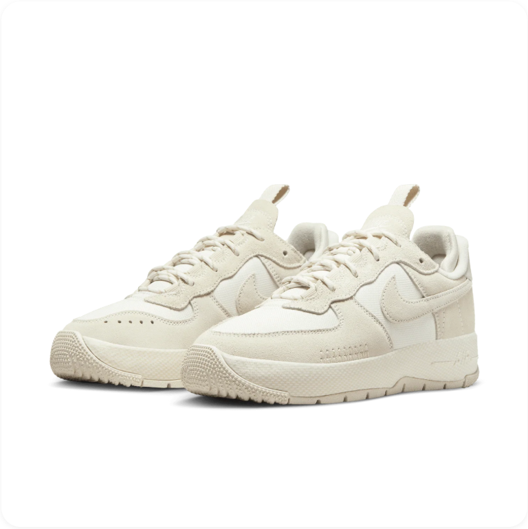 Nike Air Force 1 Wild Sail Coconut Milk - front pair view showing deconstructed AF1 silhouette with oversized heel tab and cream rubber outsole
