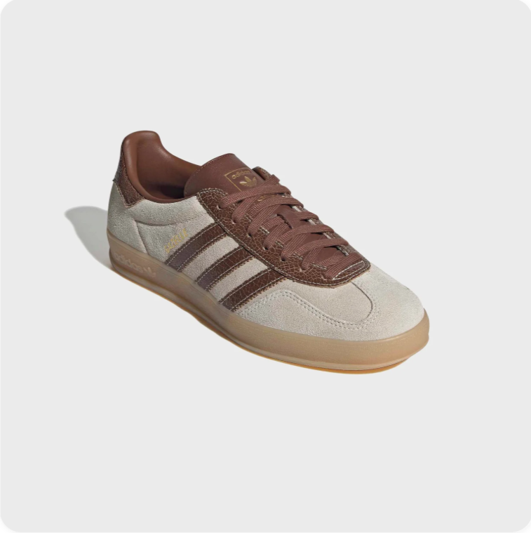 Adidas Gazelle Indoor - side profile view showing cream suede upper, brown Three Stripes and gold Gazelle lettering