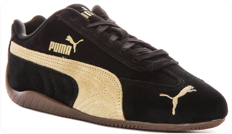Puma Speedcat Black Team Gold - side profile showing black suede upper, gold quilted Formstripe, gold Puma wordmark and gum outsole