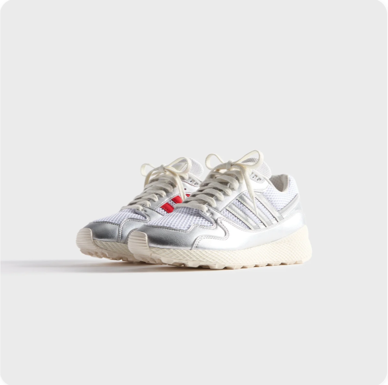 Adidas Ultratech - front pair view showing silver metallic upper, red tongue tab and cream serrated midsole