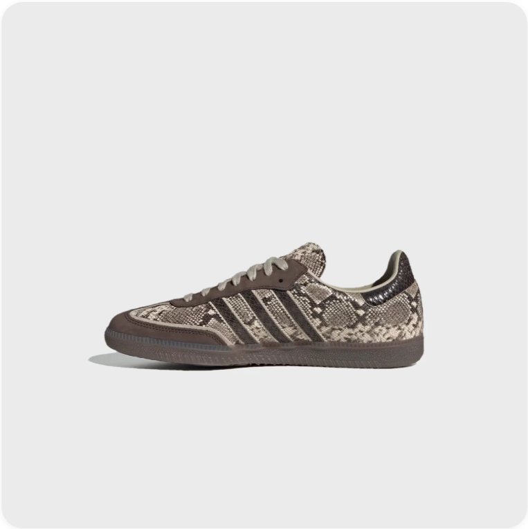 Adidas Samba OG Snakeskin - rear three-quarter view showing snakeskin print upper and dark brown rubber sole